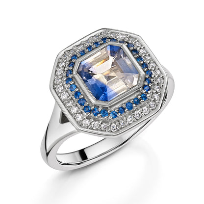 One of a kind blue and white bi-colour Sapphire and diamond cluster ring with split shank - Side Angle