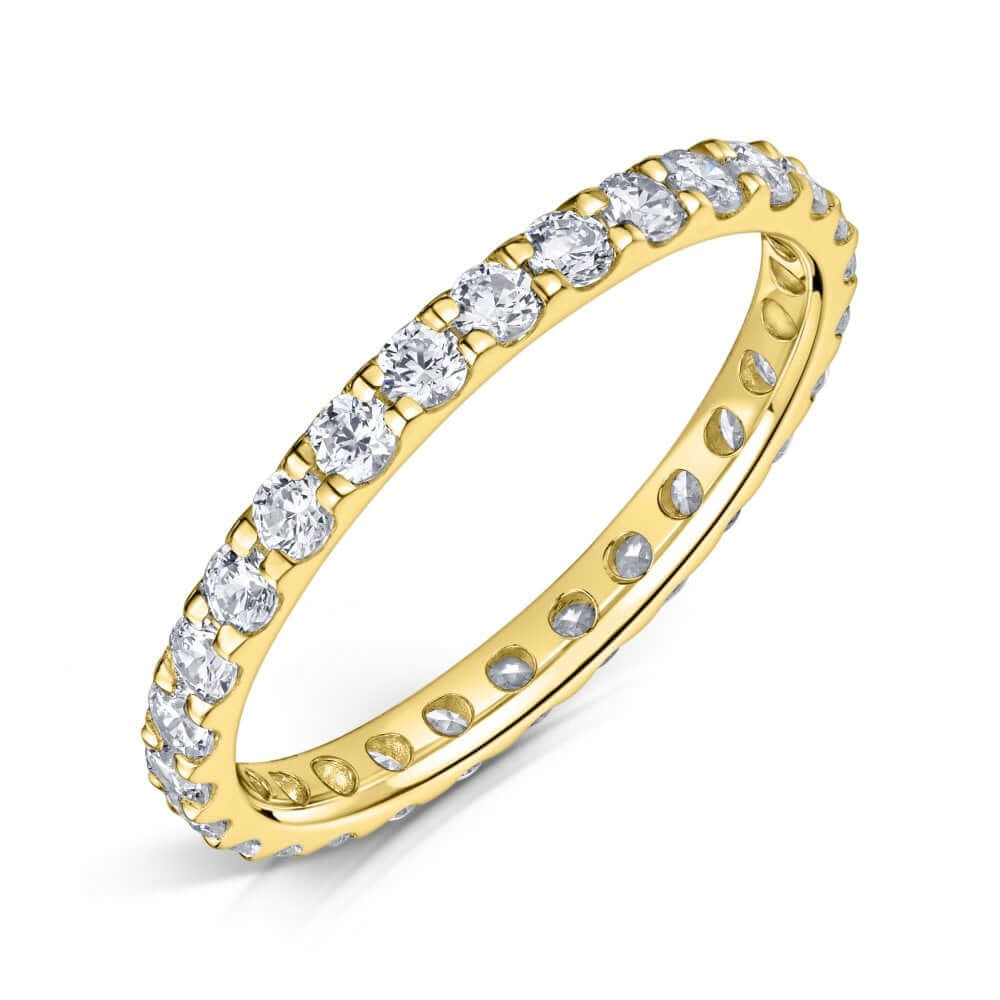 2.0mm Yellow gold eternity ring with round diamonds set all the way around on a white background.