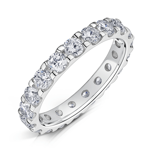 3.0mm wide platinum ring with round diamonds set all around in a claw setting on a white background.