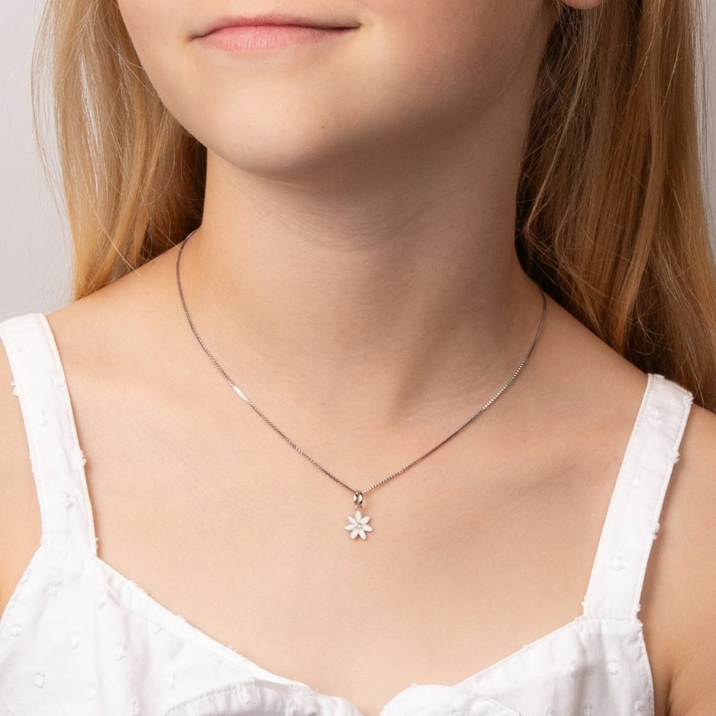 Children's Diamond Daisy Necklace on Little Girl's Neck.