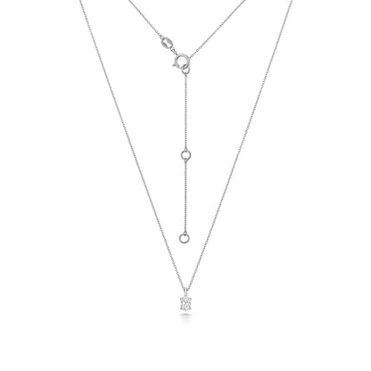 Oval Shaped Diamond Necklace in White Gold with adjustable chain on white background.