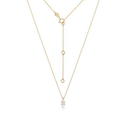 Oval Shaped Diamond Necklace in Yellow Gold with adjustable chain on white background.