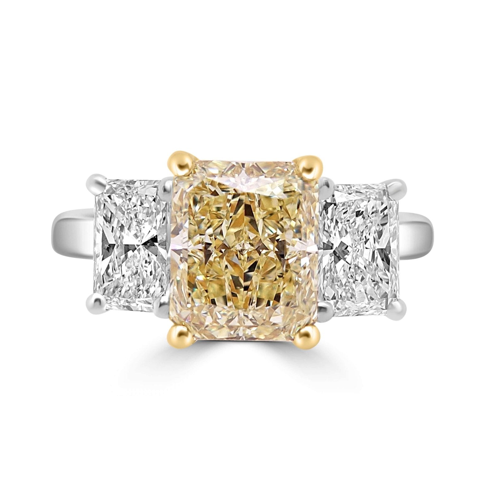 Fancy Yellow Radiant Diamond Engagement Ring on a white background.