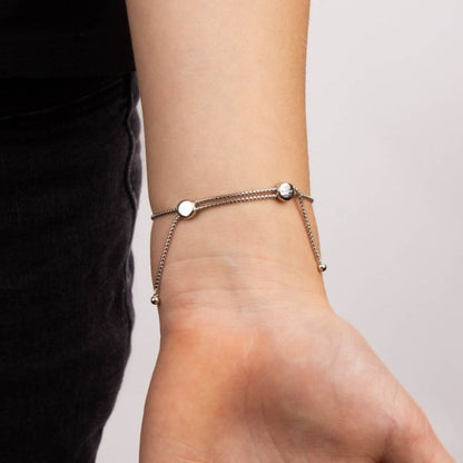 Silver Children's Forever Bracelet on model with adjustable fastening